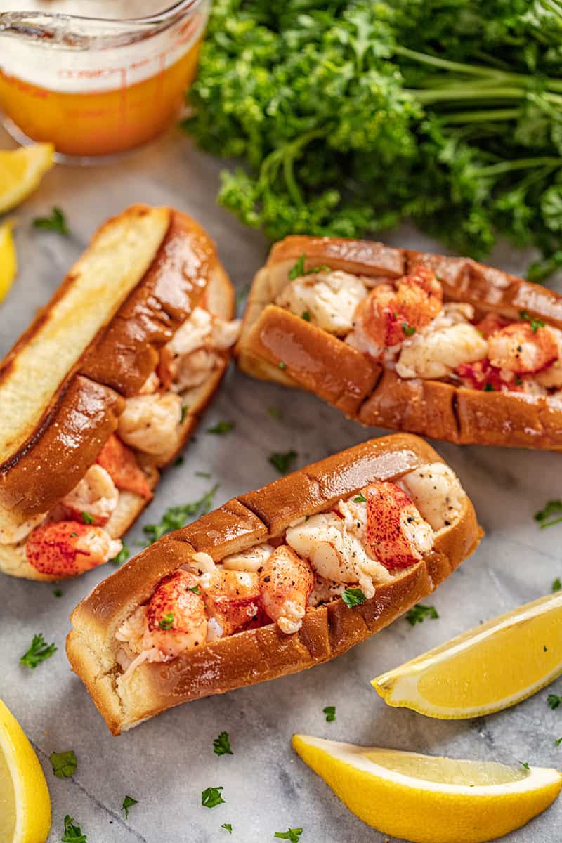 overhead view of 3 lobster rolls.